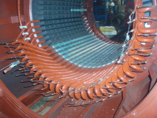 Rewinding of the stator windings of a self-excited contactless hydrogenerator of 1130kVA, 10.5 kV
